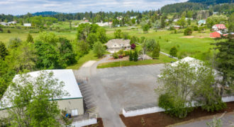 Custom Home on over 4 Acres w/ 2 Income Producing GYMS. FULL COURT BASKETBALL.