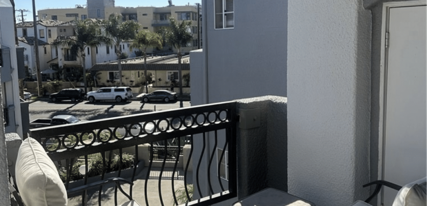 50% Ownership Beautiful sunlit condo downtown Huntington Beach – walk to beaches and cafes!